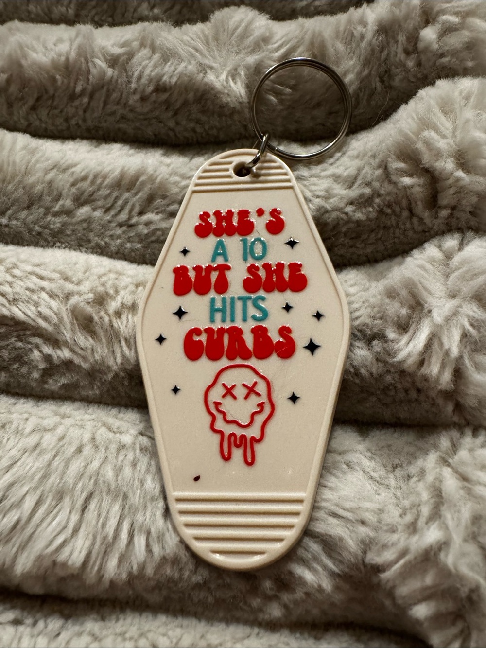 Novelty Pet Keychain - Cream 'She's a 10 But She Hits Curbs'